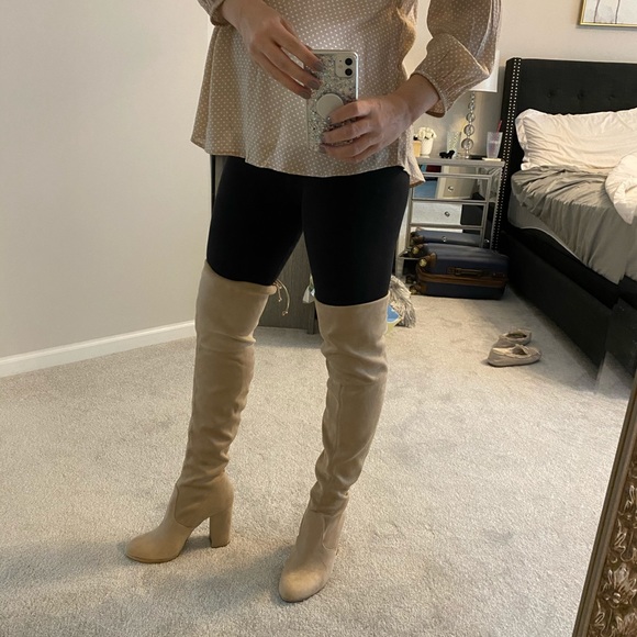 thigh high boots stay up